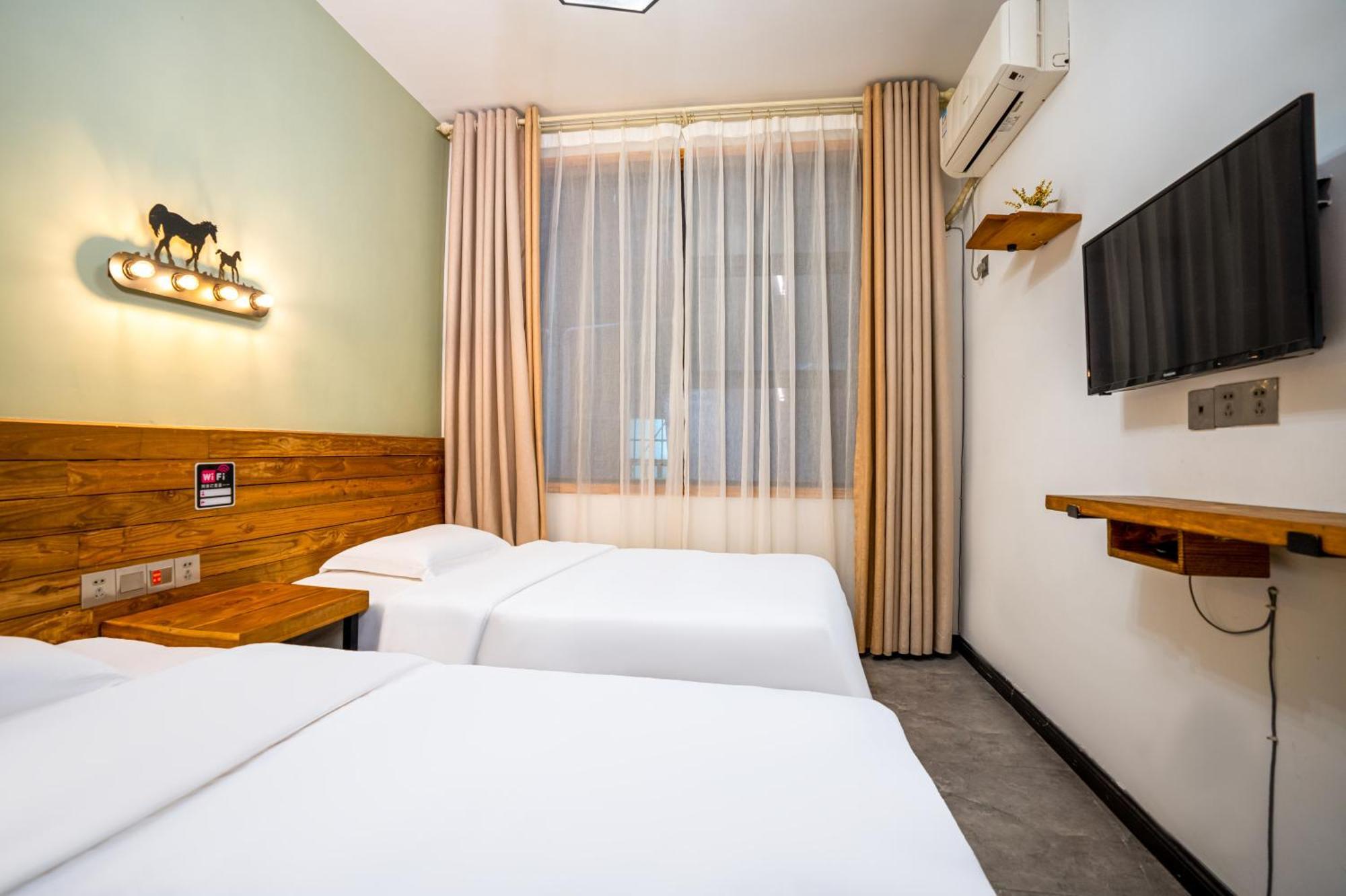 Tianmenshan Loft Art Inn Чжанцзяцзе Экстерьер фото