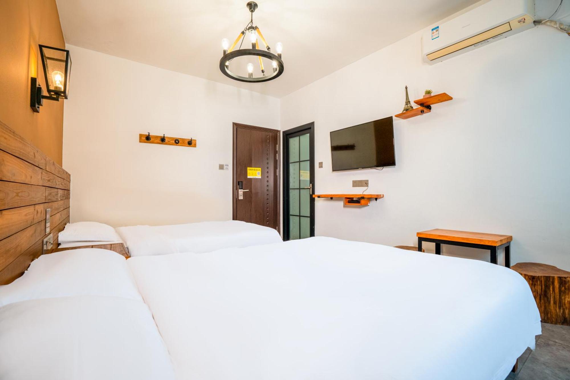 Tianmenshan Loft Art Inn Чжанцзяцзе Экстерьер фото